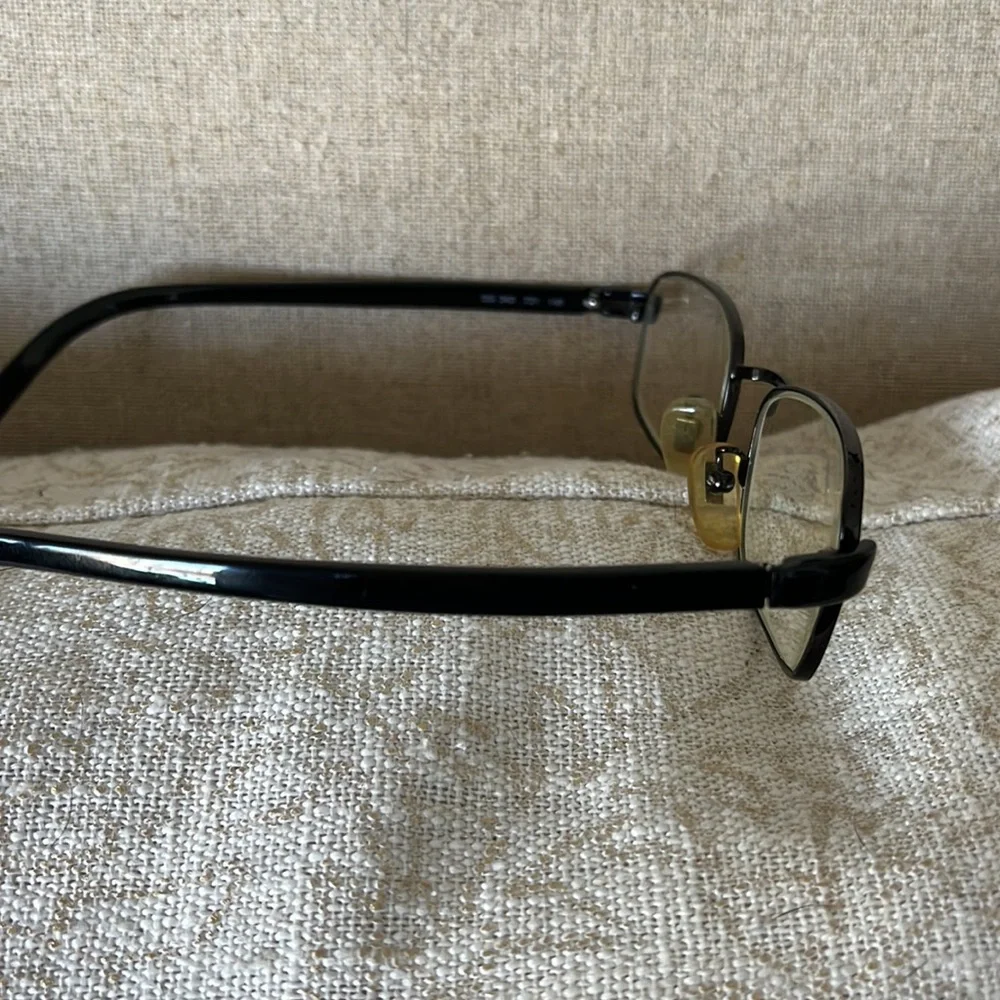 - Dolce and Gabbana black wire frame glasses